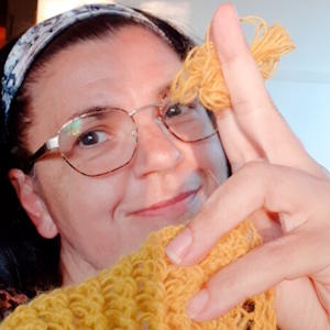 Håller i ynka liten garnsnutt